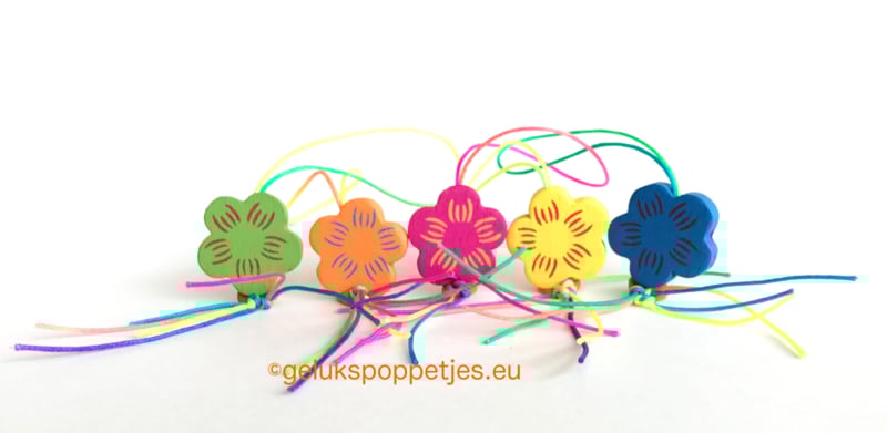 Gelukspoppetje bloem met strepen of hartjes