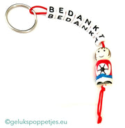 Sleutelhanger bedankt sich bei gelukspoppetje voetballer