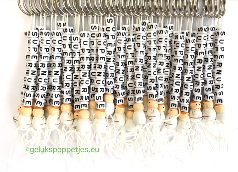 Sleutelhanger supernurse met gelukspoppetje verpleegster