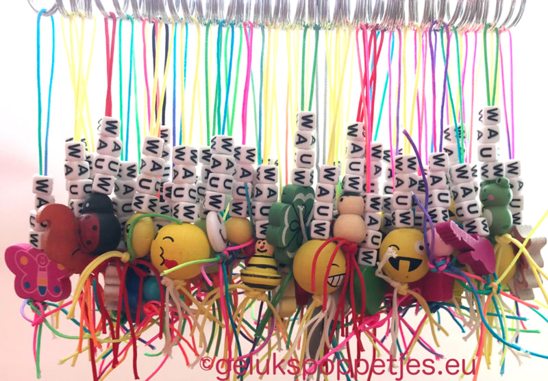 Sleutelhanger bedankt sich mit verschillenden Gelukspoppetjes