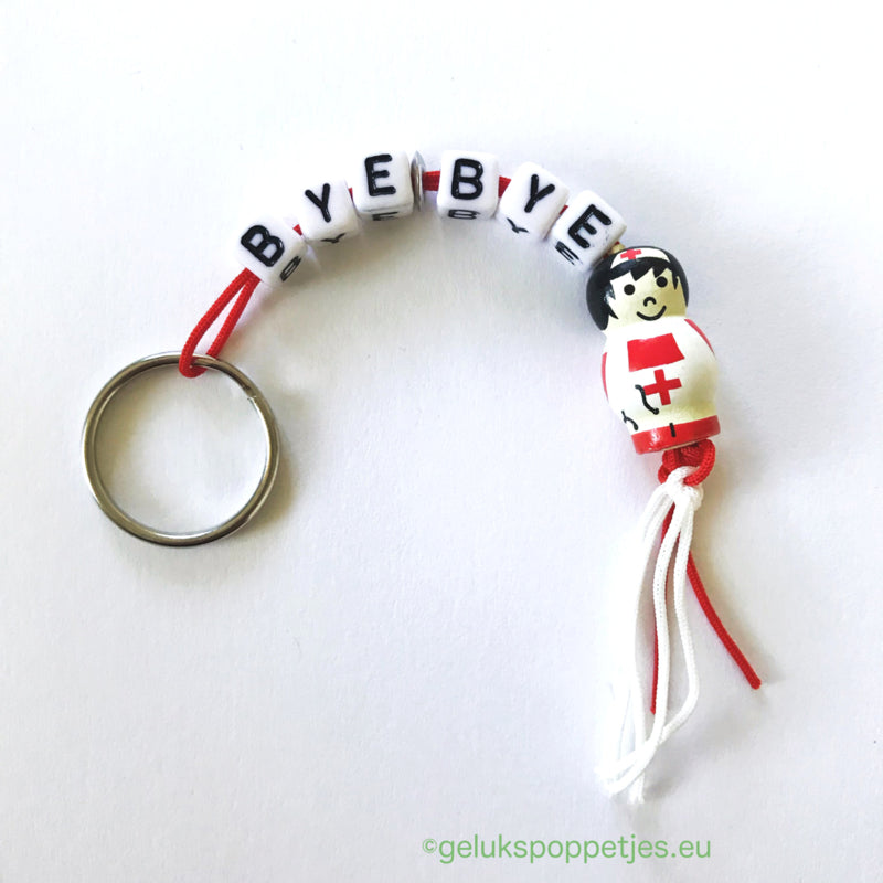 Sleutelhanger bye bye mit gelukspoppetje vogel