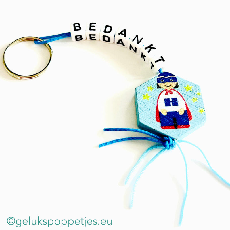 Sleutelhanger bedankt sich mit gelukspoppetje superheld