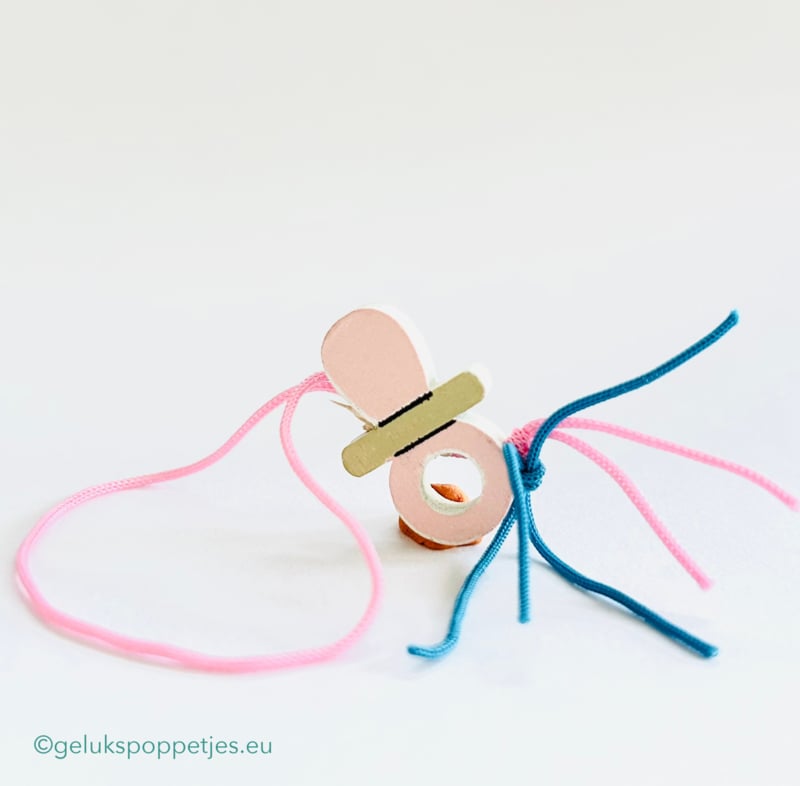 Gelukspoppetje baby speentje roze