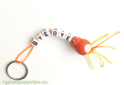 Sleutelhanger bye bye mit gelukspoppetje vogel