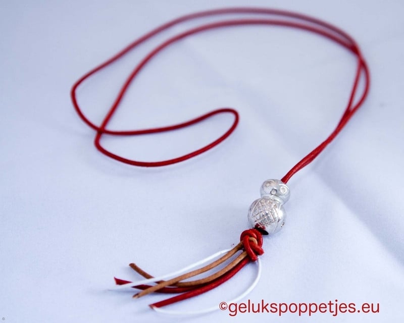 Gelukspoppetje massief zilver