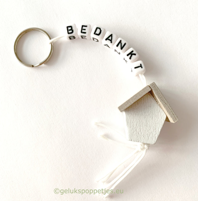 Sleutelhanger bedankt sich mit gelukspoppetje huisje