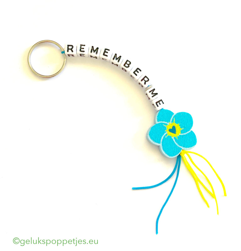 Sleutelhanger erinnere mich an mich und gelukspoppetje vergeet me nietje