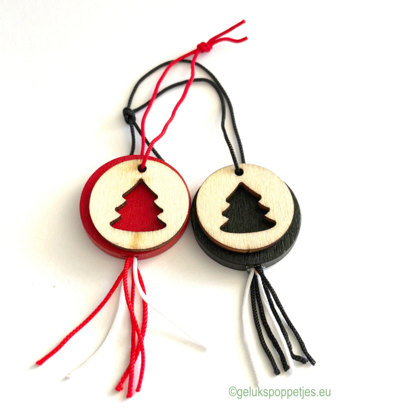 Gelukspoppetje kerstboom uitgesneden rot und schwarz