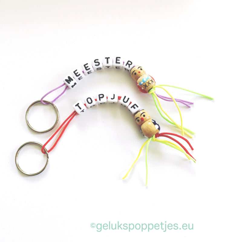 Sleutelhanger meester met houten gelukspoppetje