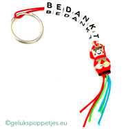 Sleutelhanger bedankt sich mit gelukspoppetje brandweermannetje