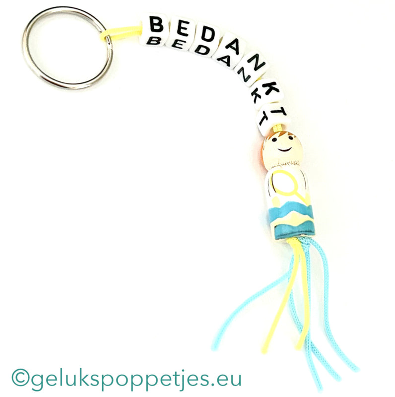 Sleutelhanger bedankt sich bei gelukspoppetje Tennisspielern