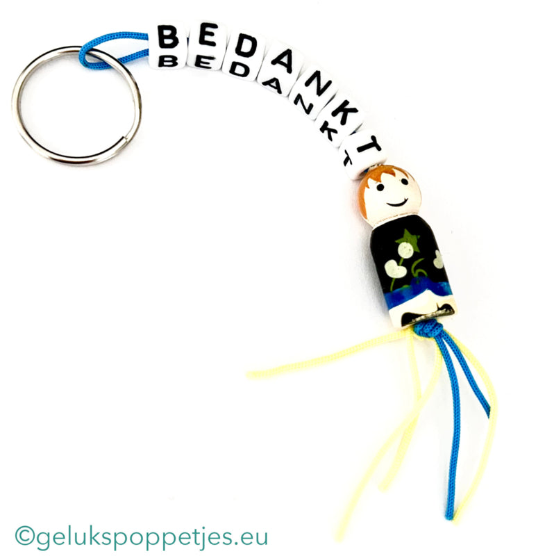Sleutelhanger bedankt sich mit gelukspoppetje muzikant