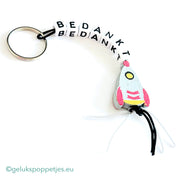 Sleutelhanger bedankt sich mit gelukspoppetje raketje