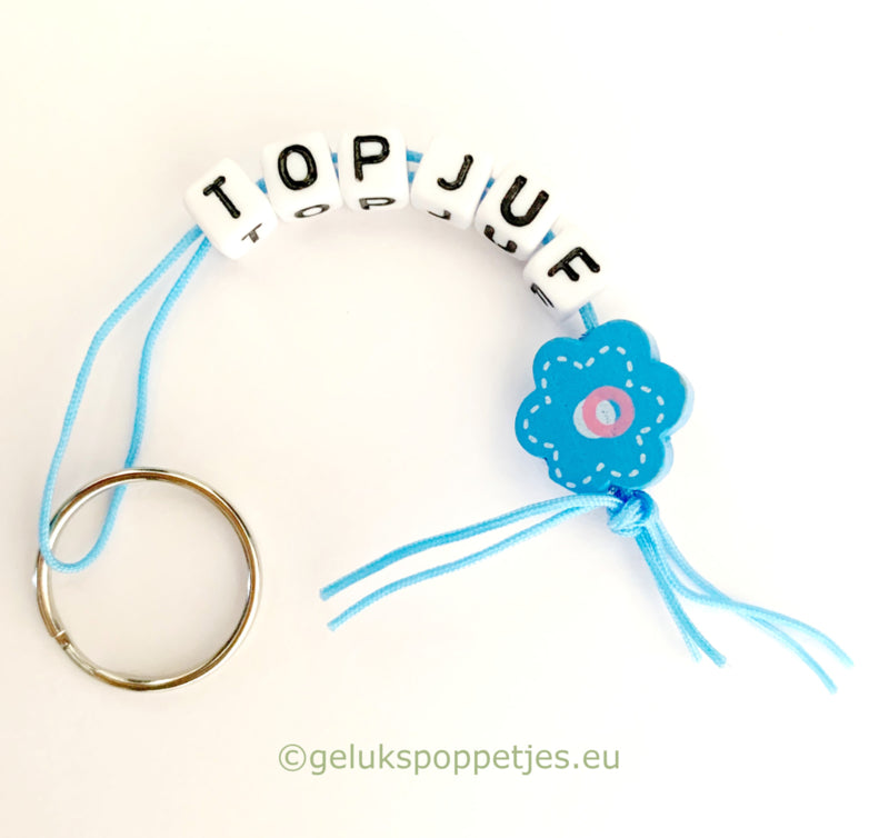 Sleutelhanger mit Dank und Gelukspoppetje vergeet-me-nietje