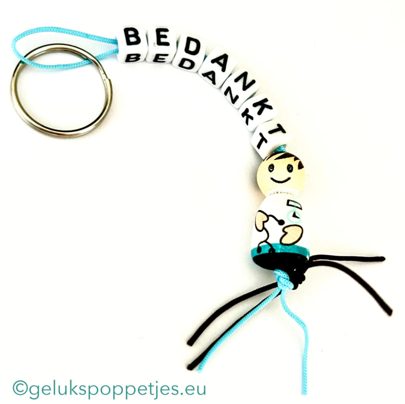 Sleutelhanger bedankt sich mit gelukspoppetje broeder