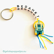 Sleutelhanger bedankt sich mit gelukspoppetje kasteel