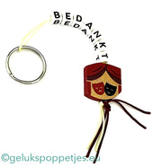 Sleutelhanger bedankt sich mit Gelukspoppetje-Theater