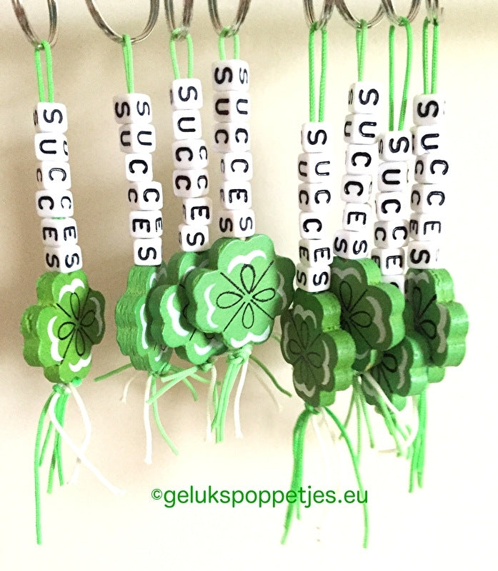 Sleutelhanger war erfolgreich mit gelukspoppetje klavertje vier