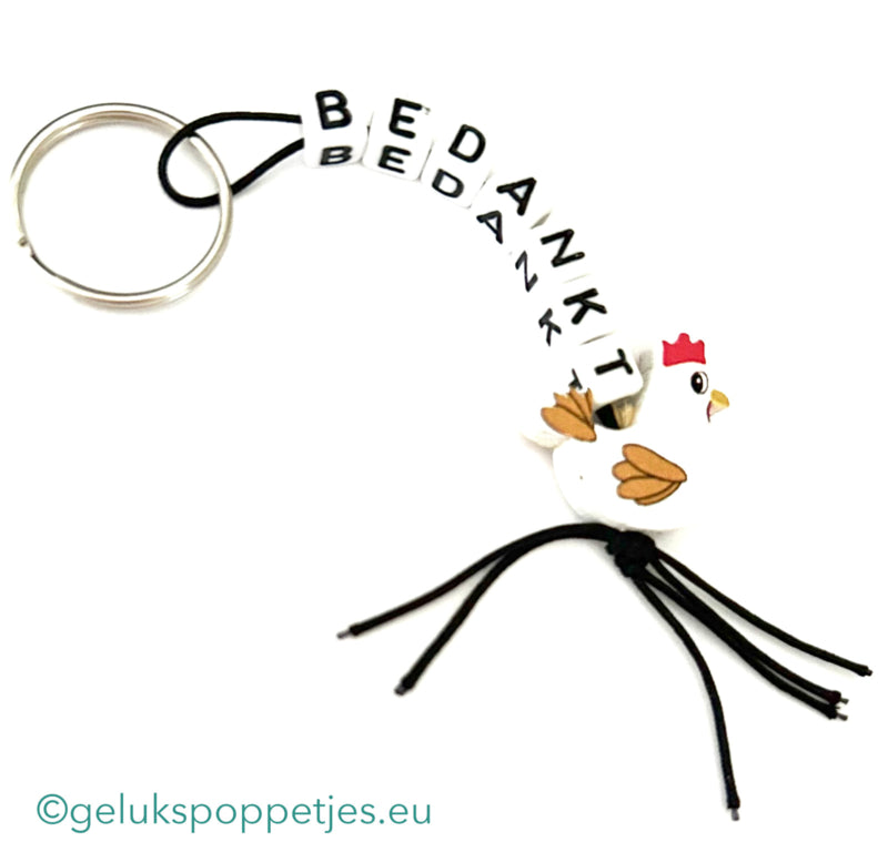 Bedankt sleutelhanger met gelukspoppetje kip