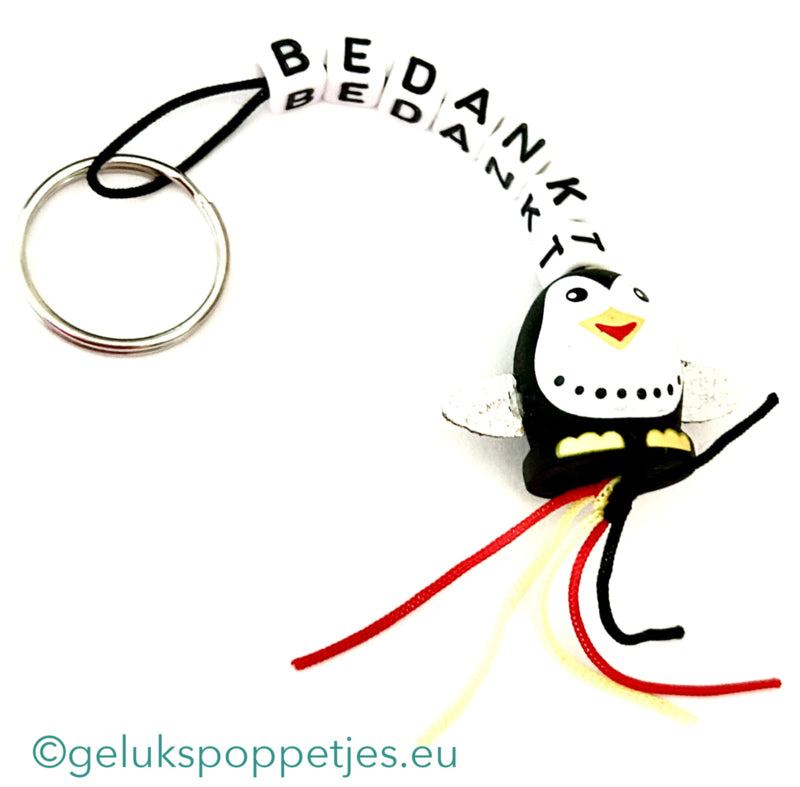 Sleutelhanger bedankt sich bei gelukspoppetje pinguin